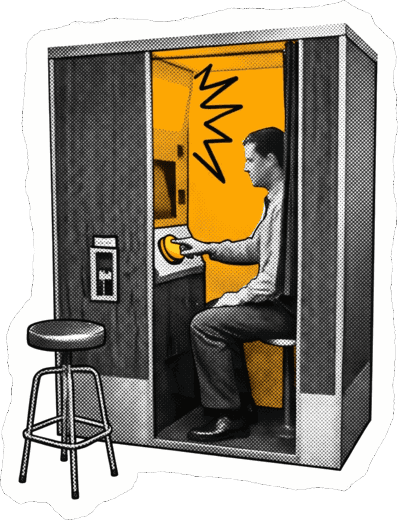 Une personne utilise seule un photomaton en libre-service
